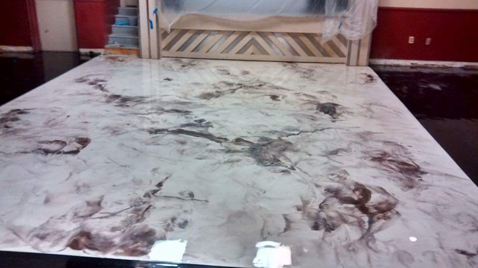 White metallic polyaspartic floor in commercial space Hinesville GA